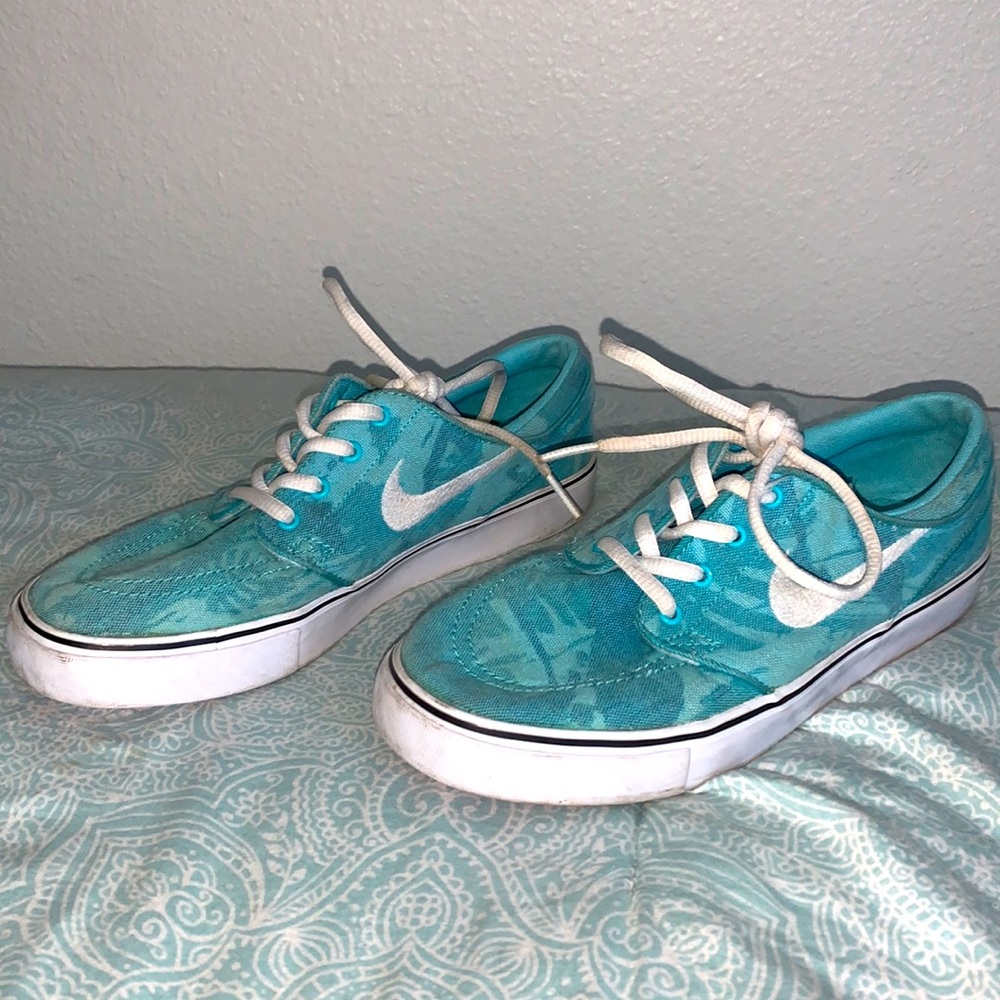 Blue and white Nike skateboarding shoes